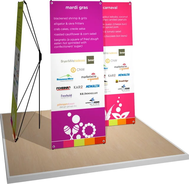 portable X-stand display where the banner stand graphics are manually unrolled and attached to the hardware. 