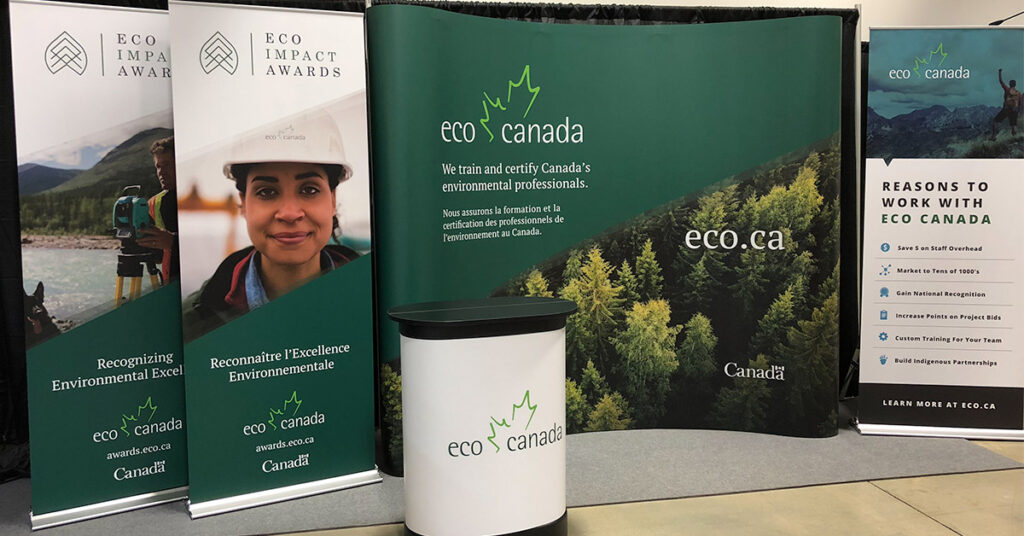 curved portable pop-up trade show display, 3 retractable banner stands, and a portable podium for a Canadian trade show exhibitor.