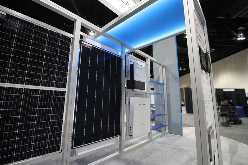 custom modular display structures that hold up solar panels and create a partition