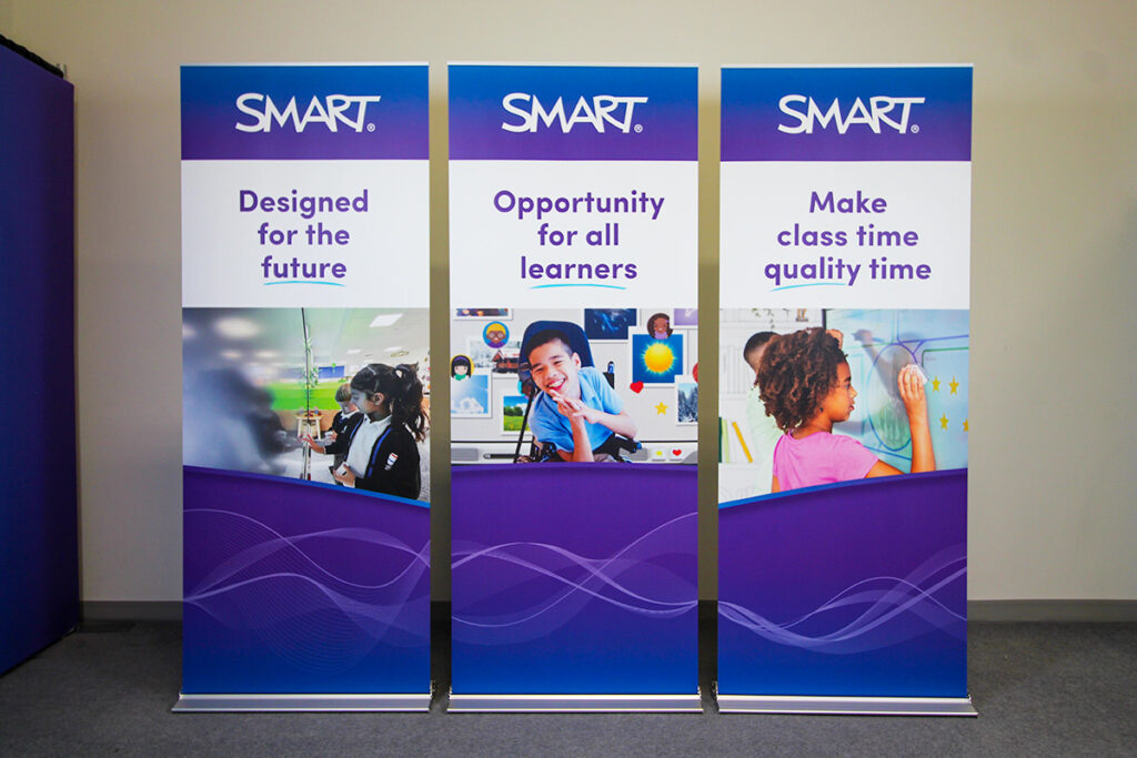 set of 3 retractable portable banner stands in Calgary for a technology company. 