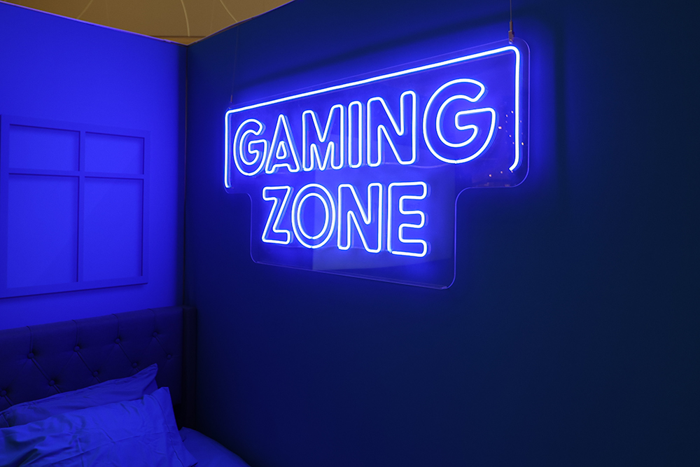 custom LED sign with a neon look that reads "Gaming Zone"